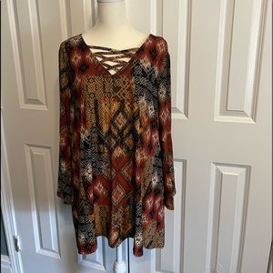 Bohemian with flair sleeves top. Can be worn as tunic .